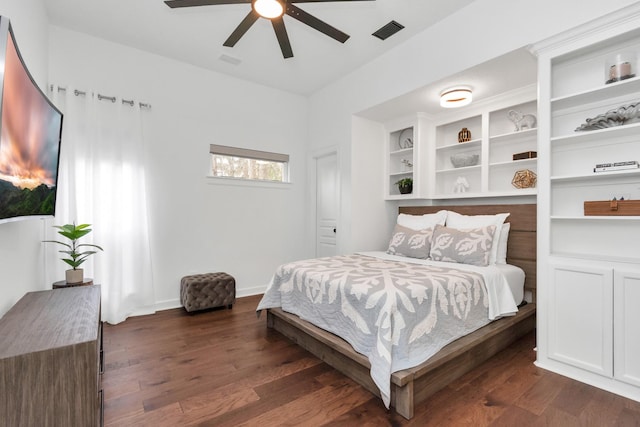 bedroom featuring ceiling fan and dark hardwood / wood-style floors