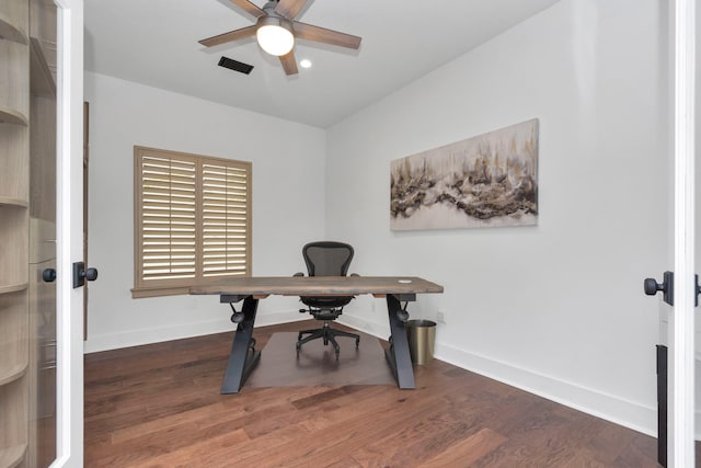 office space with dark hardwood / wood-style flooring and ceiling fan