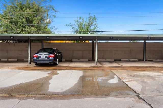 view of car parking featuring a carport