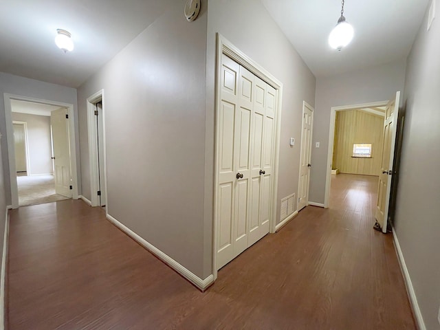 hall with hardwood / wood-style flooring