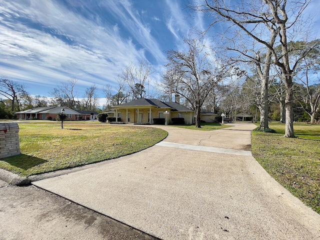 view of front of property with a front lawn