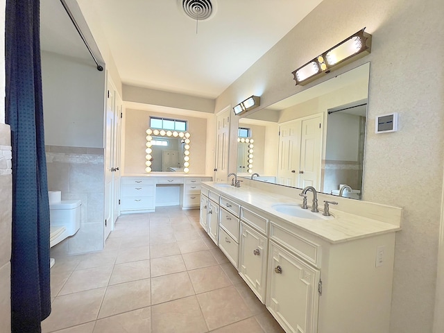 bathroom featuring vanity and tile patterned floors