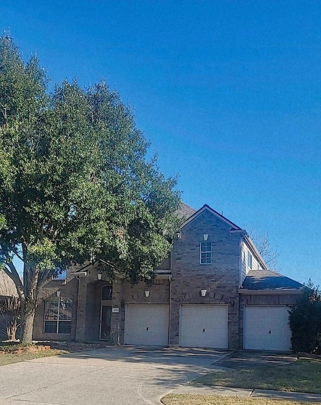 view of front of property with a garage