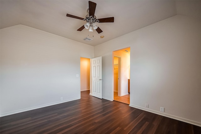 unfurnished bedroom with visible vents, a ceiling fan, dark wood-style floors, a closet, and baseboards