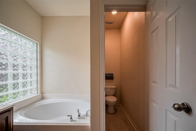 full bathroom with a bath, visible vents, and toilet