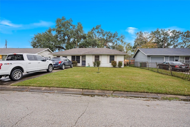 ranch-style house with a front yard