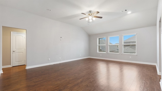 unfurnished room with lofted ceiling, dark hardwood / wood-style flooring, and ceiling fan