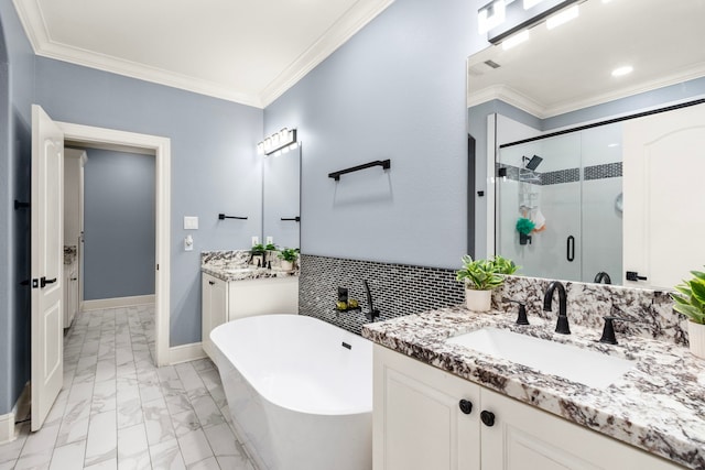 bathroom with vanity, crown molding, and shower with separate bathtub