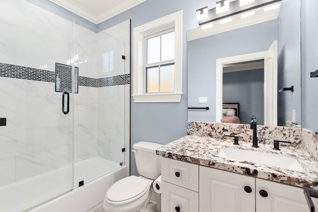 full bathroom with enclosed tub / shower combo, toilet, vanity, and ornamental molding