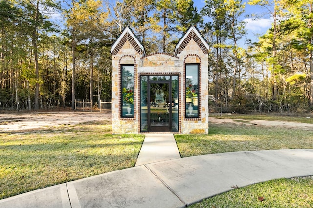 exterior space with a lawn