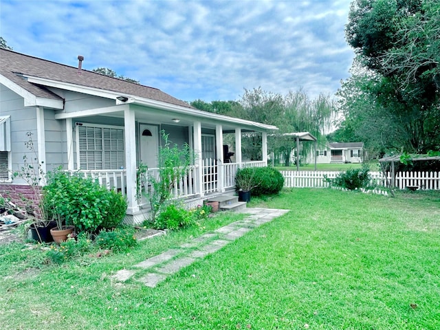 view of yard with a porch