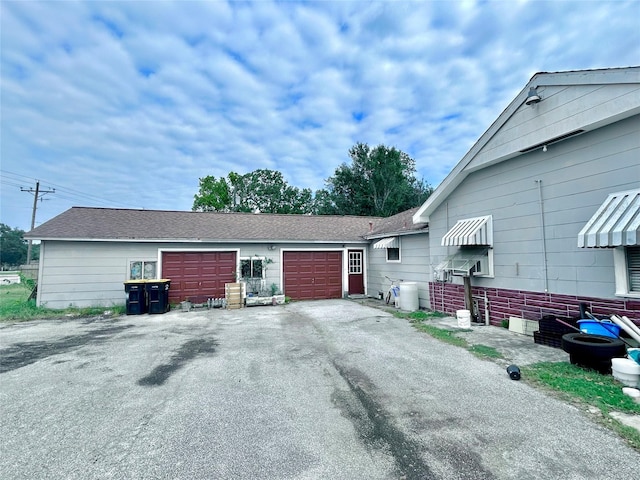 exterior space with a garage