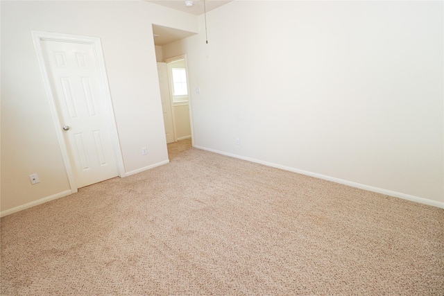 spare room featuring carpet flooring