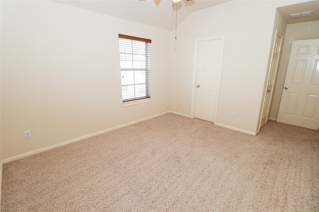 unfurnished bedroom with lofted ceiling, carpet flooring, and ceiling fan