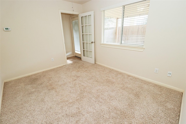 view of carpeted spare room