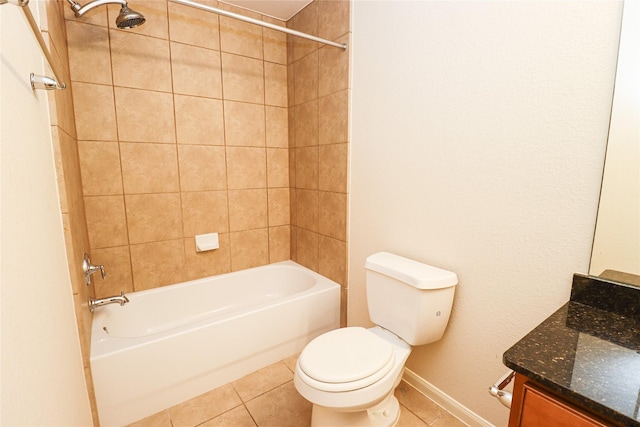 full bathroom featuring vanity, tiled shower / bath combo, tile patterned floors, and toilet