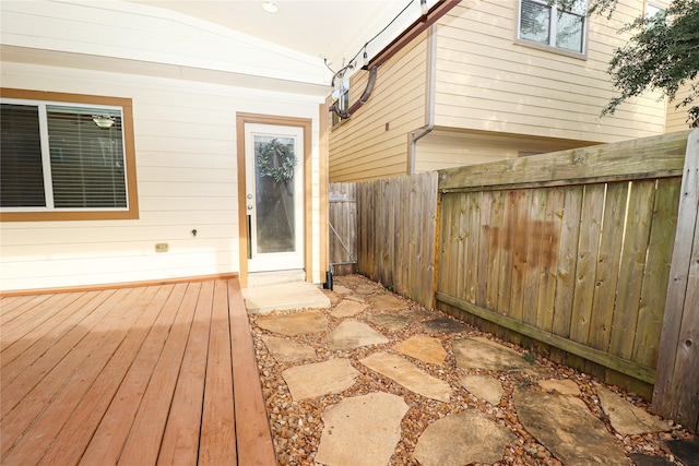 entrance to property with a wooden deck