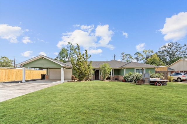 ranch-style home featuring a garage, a carport, and a front lawn