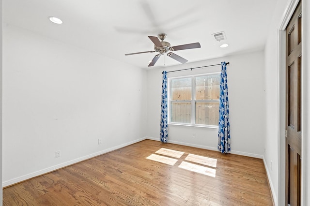 unfurnished room featuring ceiling fan and light hardwood / wood-style flooring