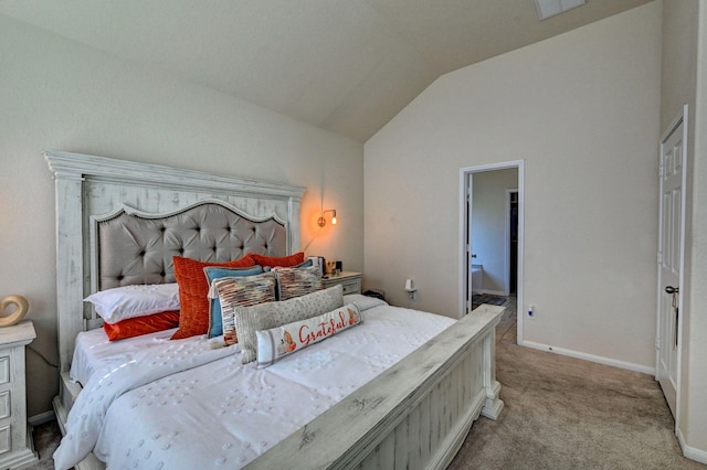 carpeted bedroom featuring lofted ceiling