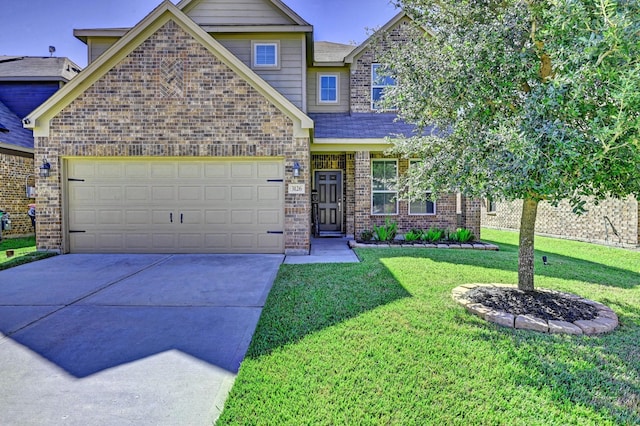 craftsman-style home featuring a front yard and a garage