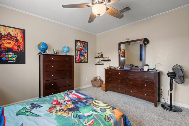 bedroom with crown molding, ceiling fan, and light carpet