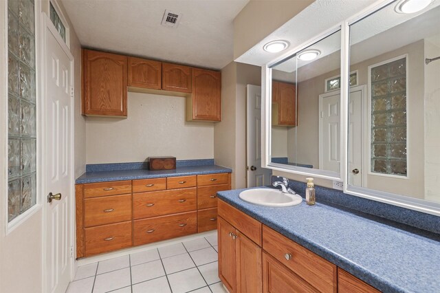 bathroom featuring vanity and tile patterned floors