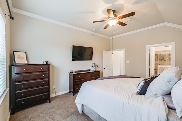 carpeted bedroom with lofted ceiling, ceiling fan, crown molding, and ensuite bath