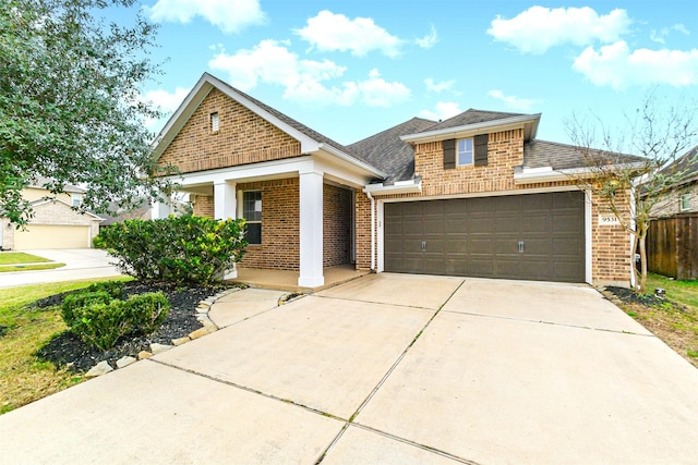 view of front of property with a garage