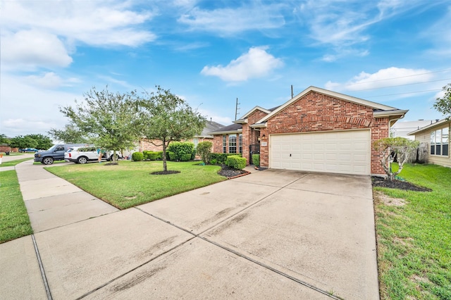 view of front of house with a garage and a front yard