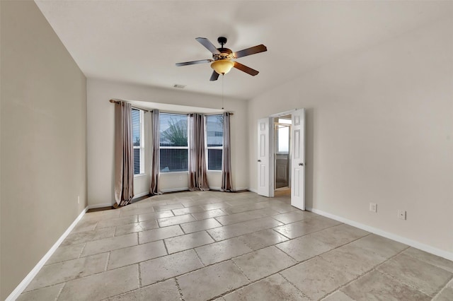 unfurnished room featuring ceiling fan