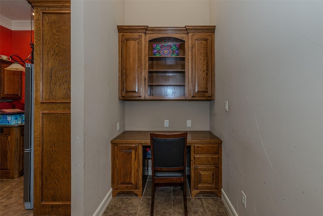 office space with ornamental molding