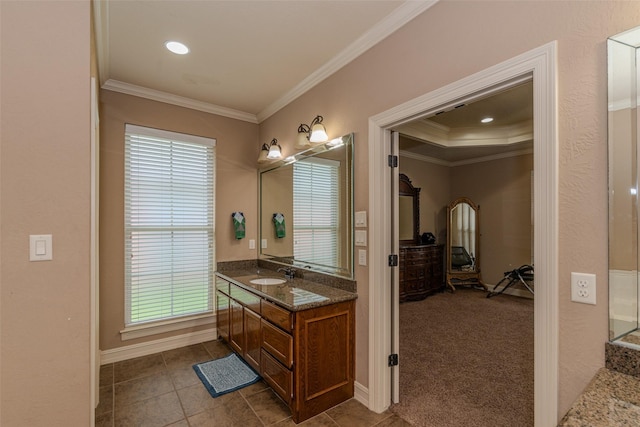 bathroom featuring vanity, tile patterned floors, and ornamental molding