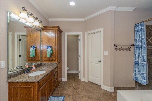 bathroom with ornamental molding, tile patterned floors, vanity, and toilet