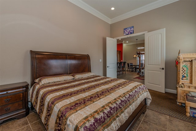 bedroom with crown molding and a chandelier