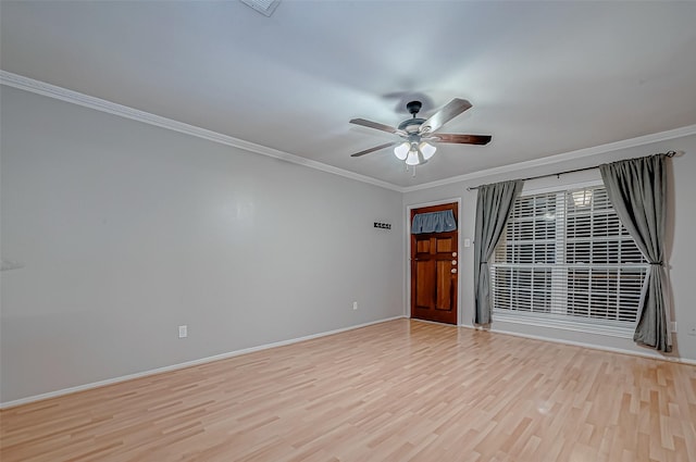 unfurnished room with ornamental molding, ceiling fan, and light hardwood / wood-style flooring