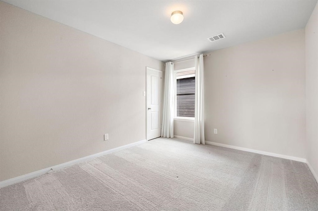 view of carpeted spare room