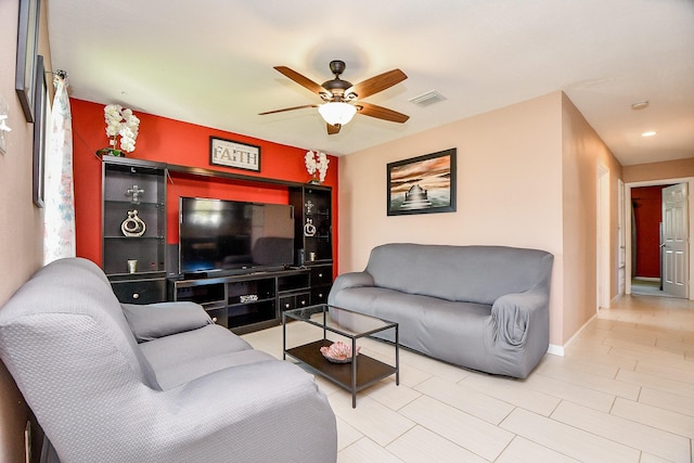 living room with ceiling fan