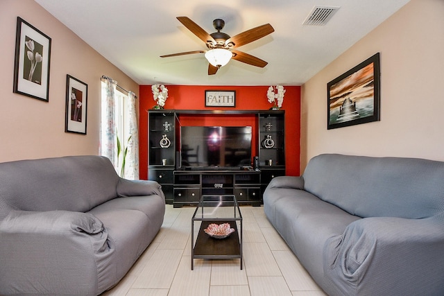 living room with ceiling fan