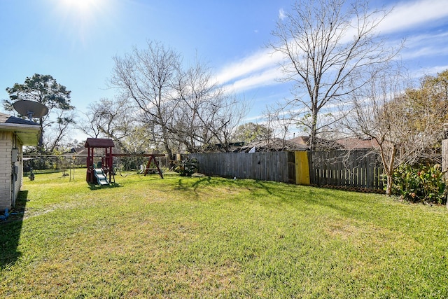 view of yard with a playground