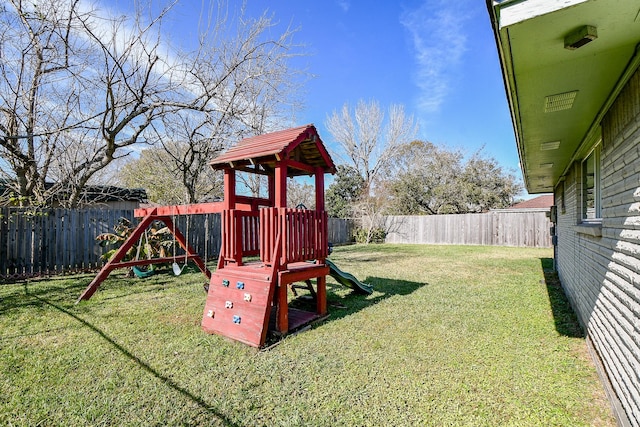 view of play area featuring a lawn