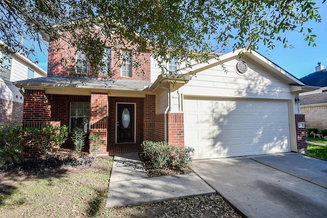 view of front of home with covered porch and a garage