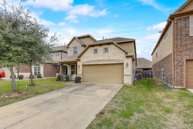 view of front of home featuring a front yard, a garage, and cooling unit