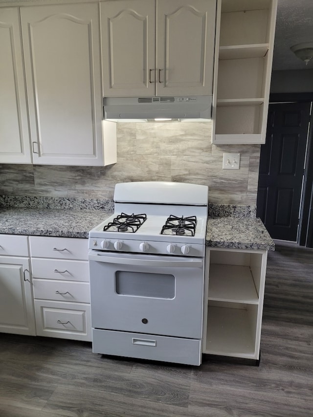 kitchen featuring light stone counters, white cabinetry, white gas stove, and dark hardwood / wood-style floors