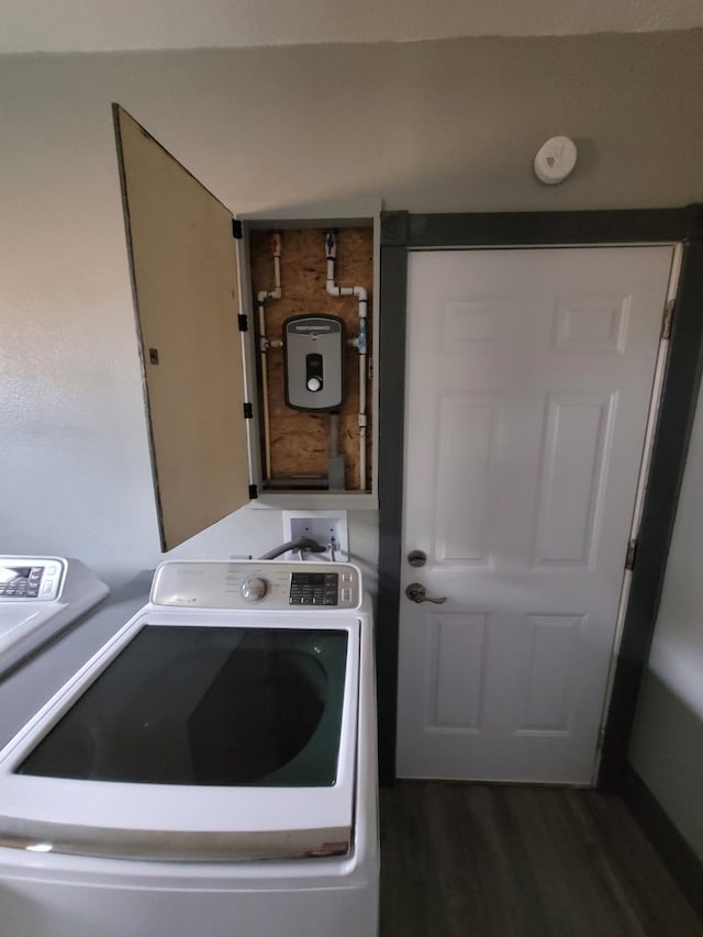 laundry room featuring hardwood / wood-style flooring and washer / clothes dryer