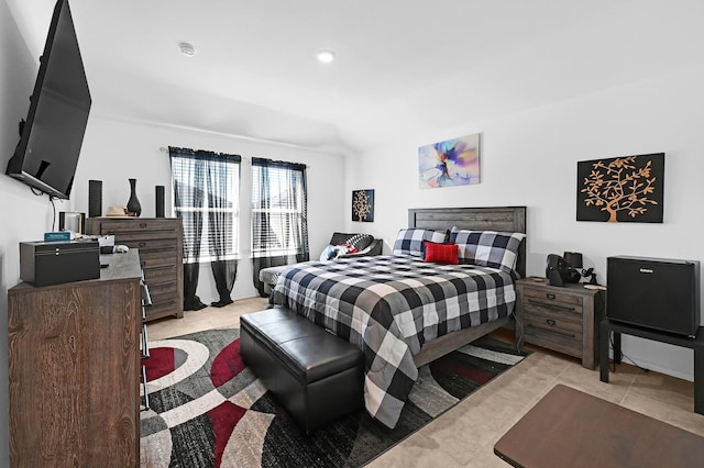 bedroom featuring light tile patterned floors