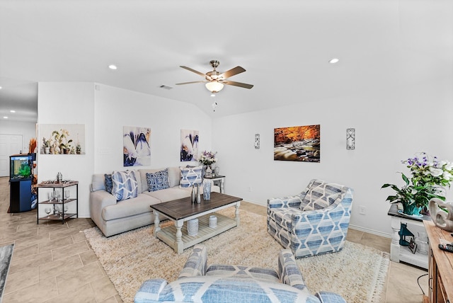 tiled living room with ceiling fan and lofted ceiling