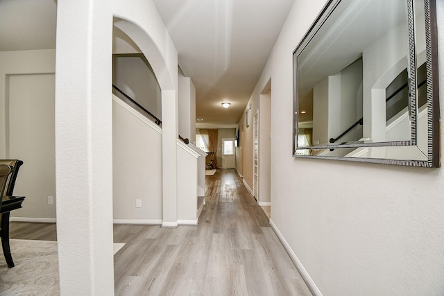 hall with light wood-type flooring