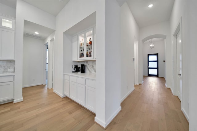 hall featuring light wood-type flooring