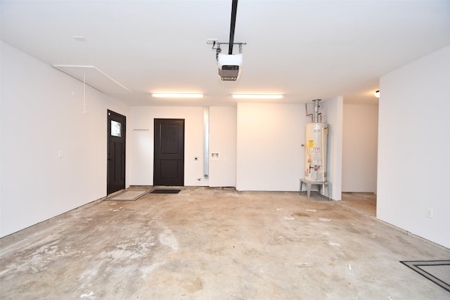 garage featuring water heater and a garage door opener